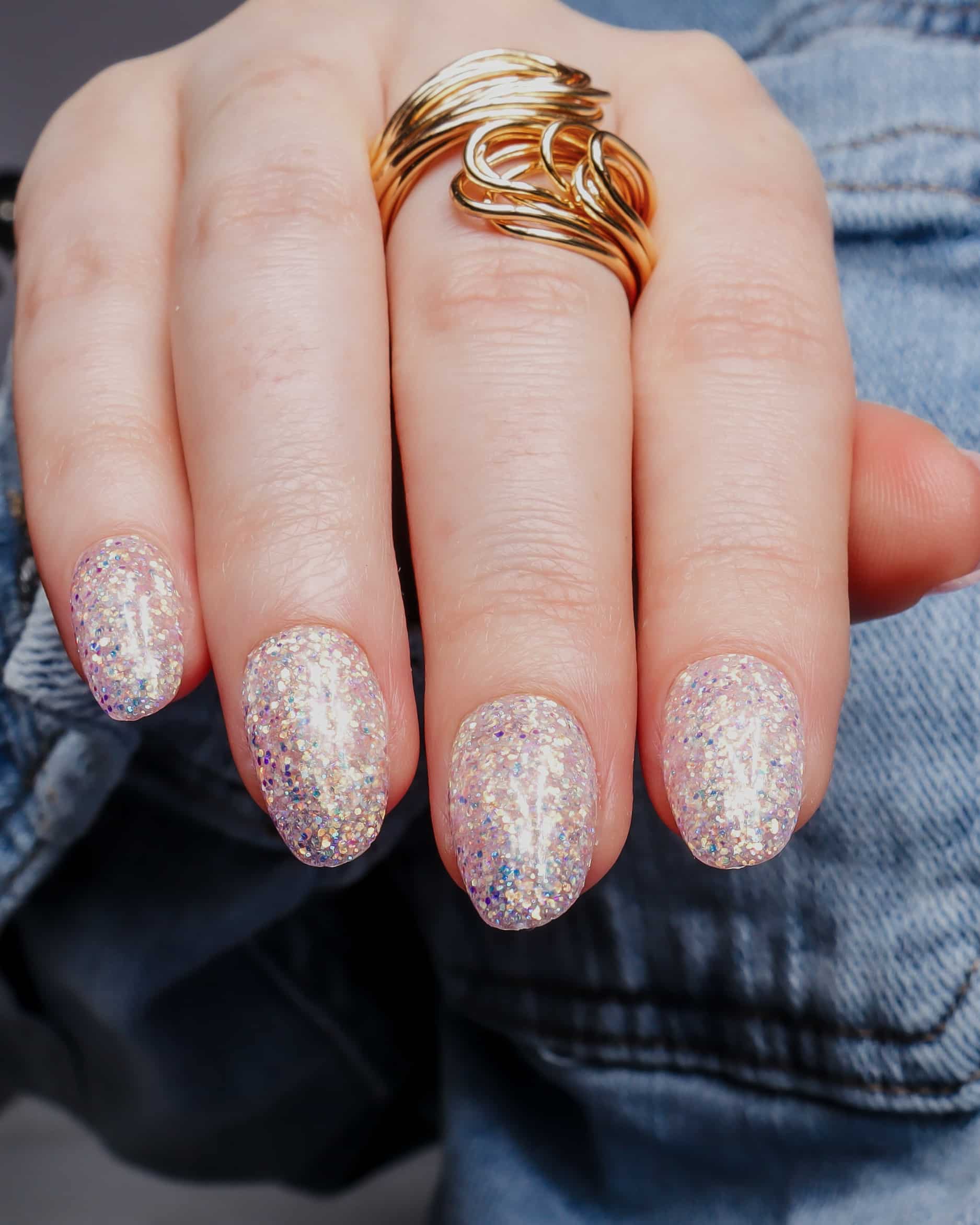 Glitter nails. Encapsulated glitter. Reusable nail extensions. 