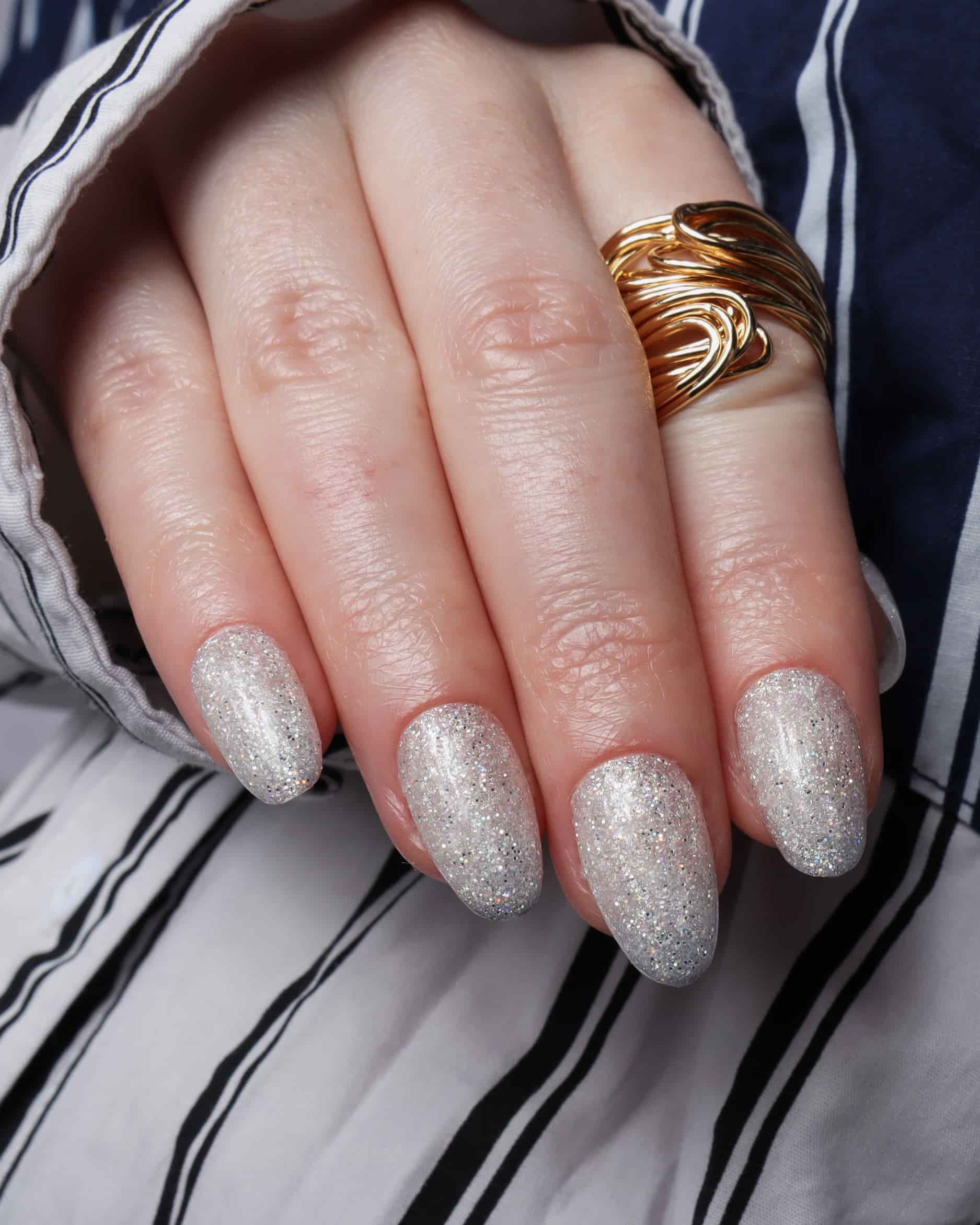 Glitter nails. Encapsulated glitter. Reusable nail extensions. 