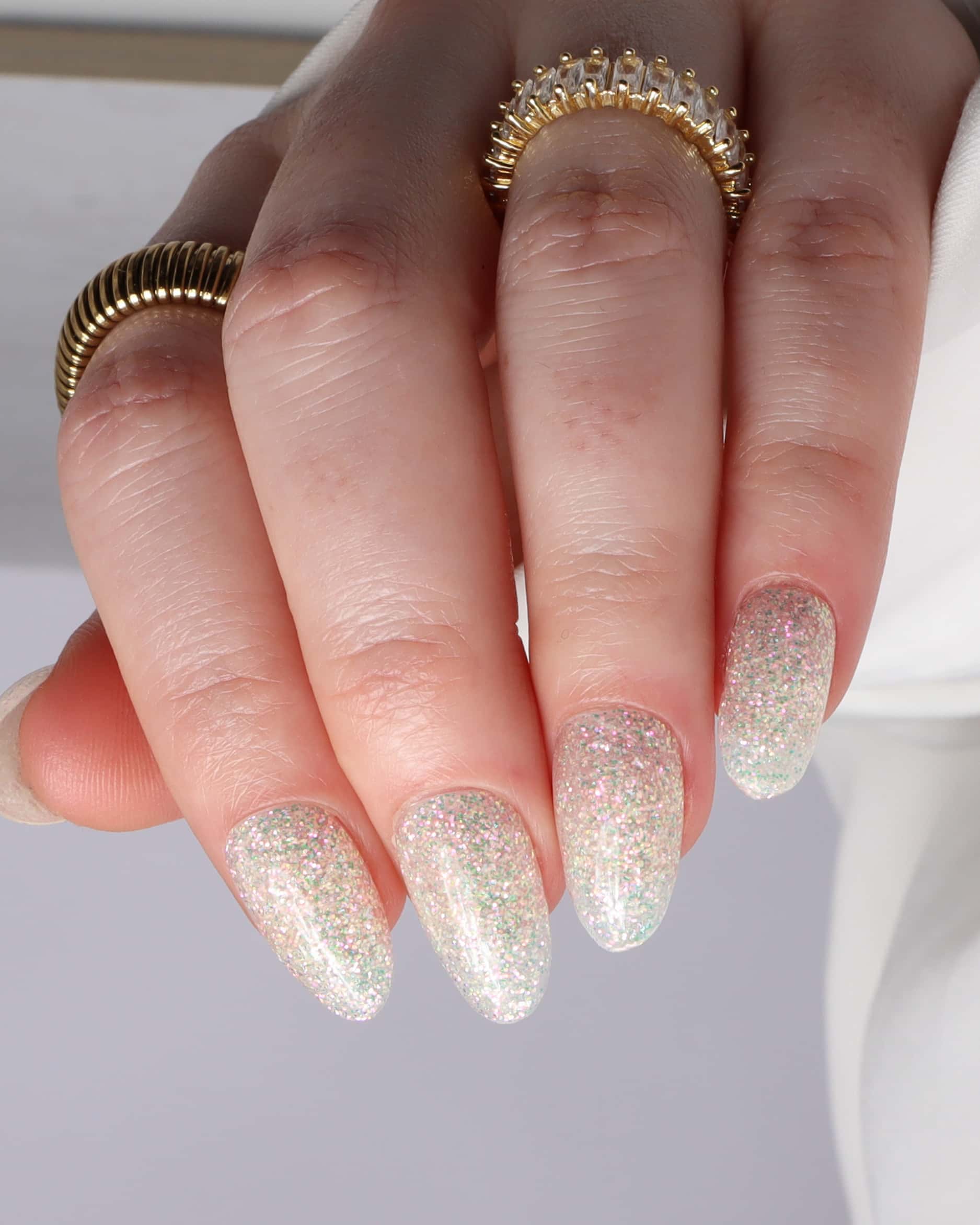 Glitter nails. Encapsulated glitter. Reusable nail extensions. 
