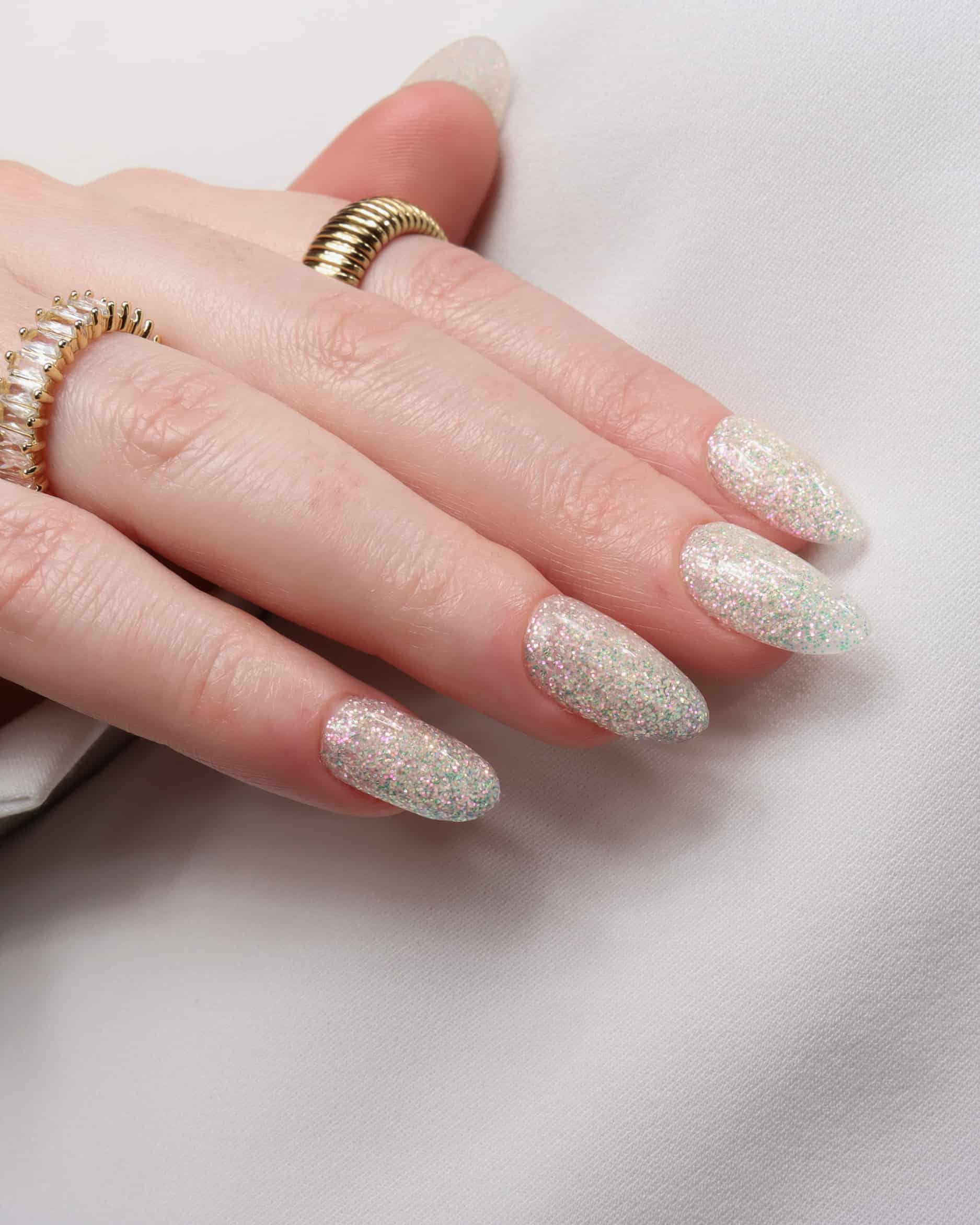 Glitter nails. Encapsulated glitter. Reusable nail extensions. 