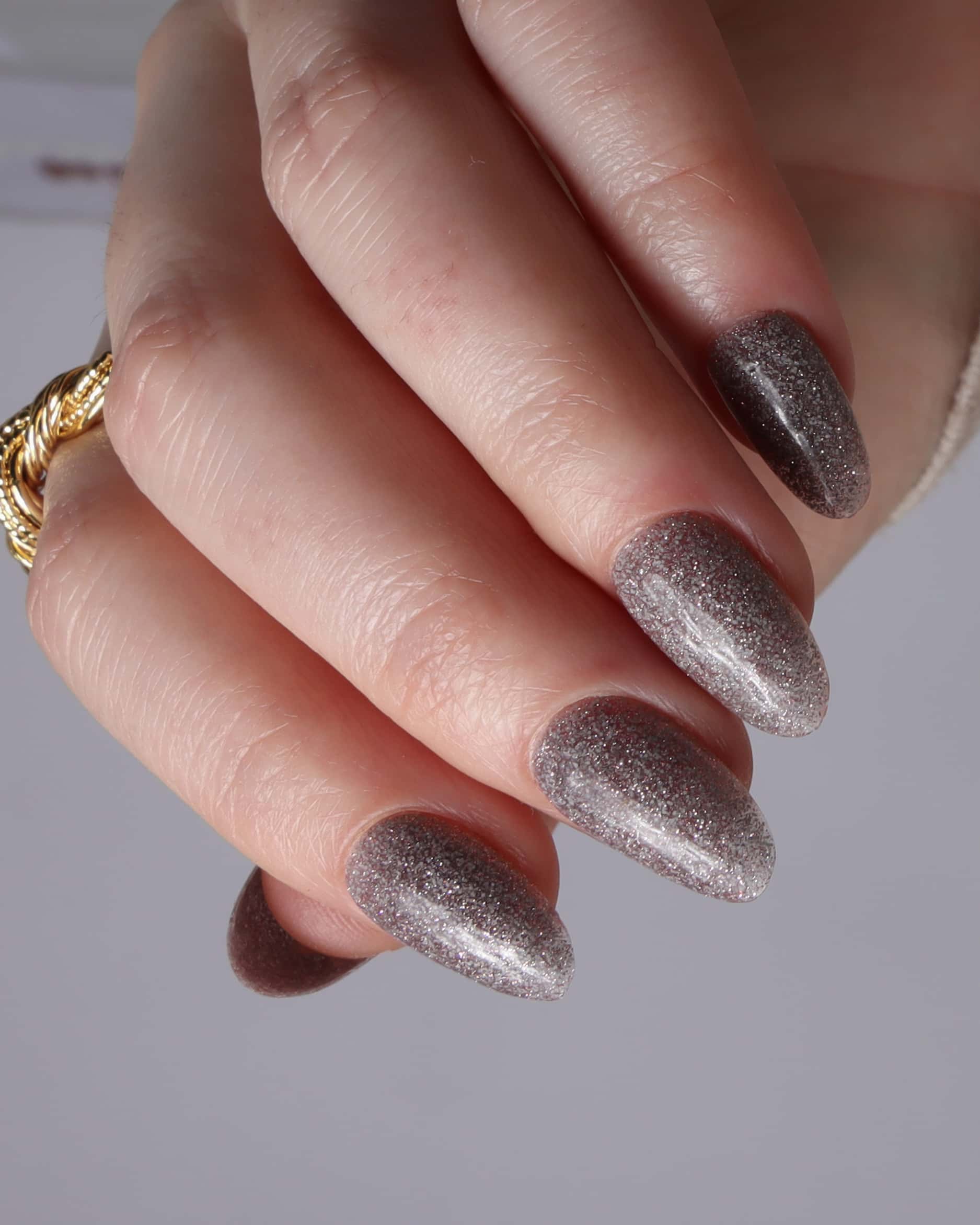 Glitter nails. Encapsulated glitter. Reusable nail extensions. 