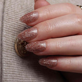 Glitter nails. Encapsulated glitter. Reusable nail extensions. 