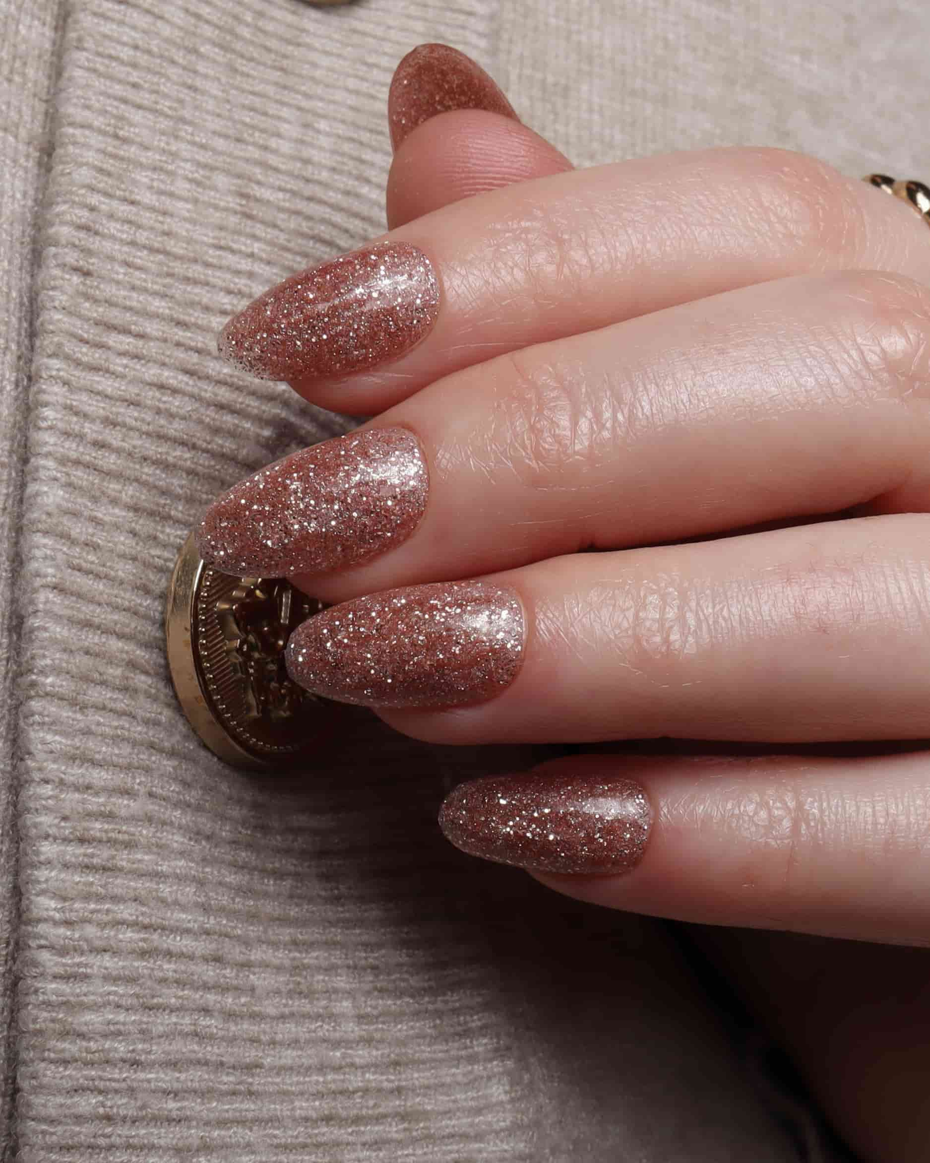 Glitter nails. Encapsulated glitter. Reusable nail extensions. 