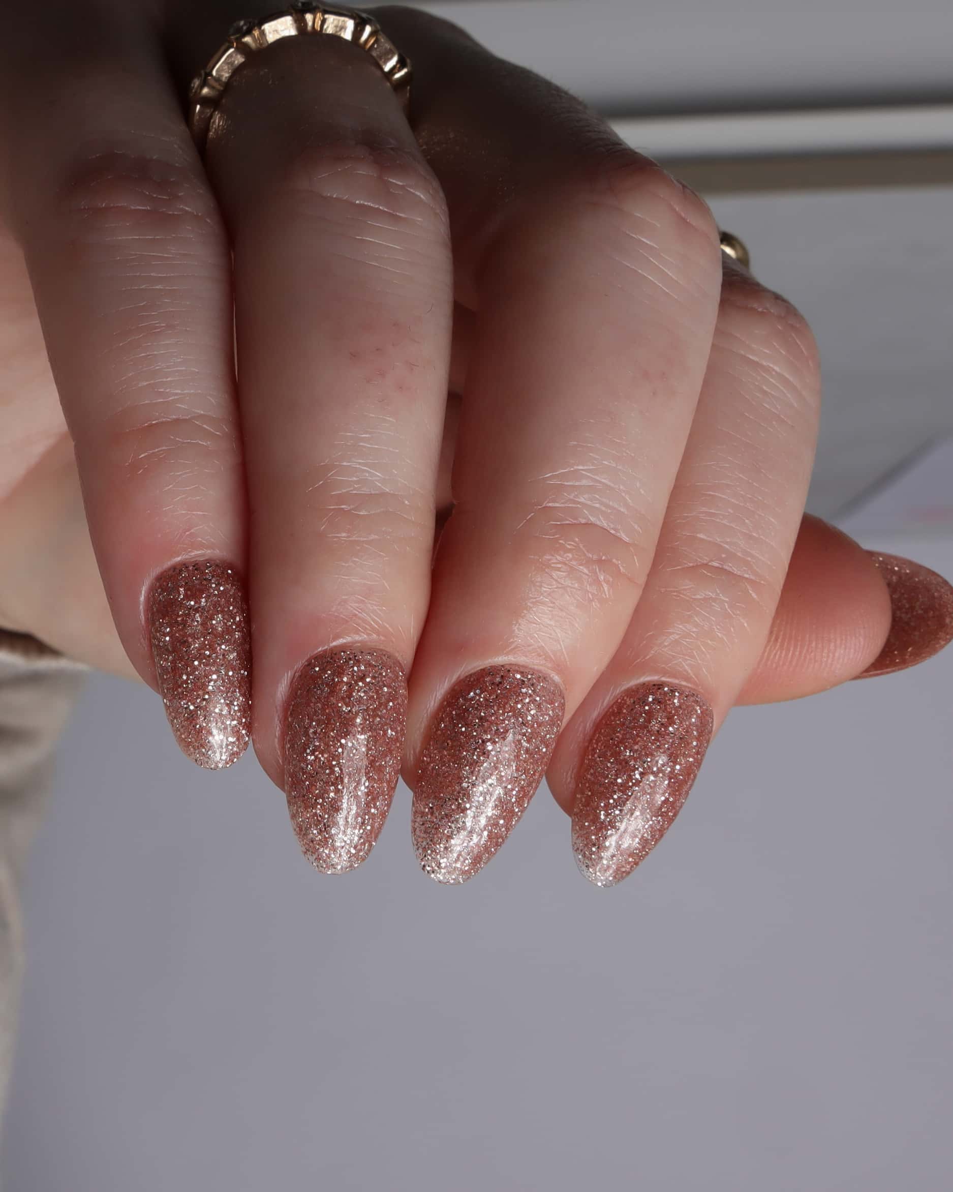 Glitter nails. Encapsulated glitter. Reusable nail extensions. 