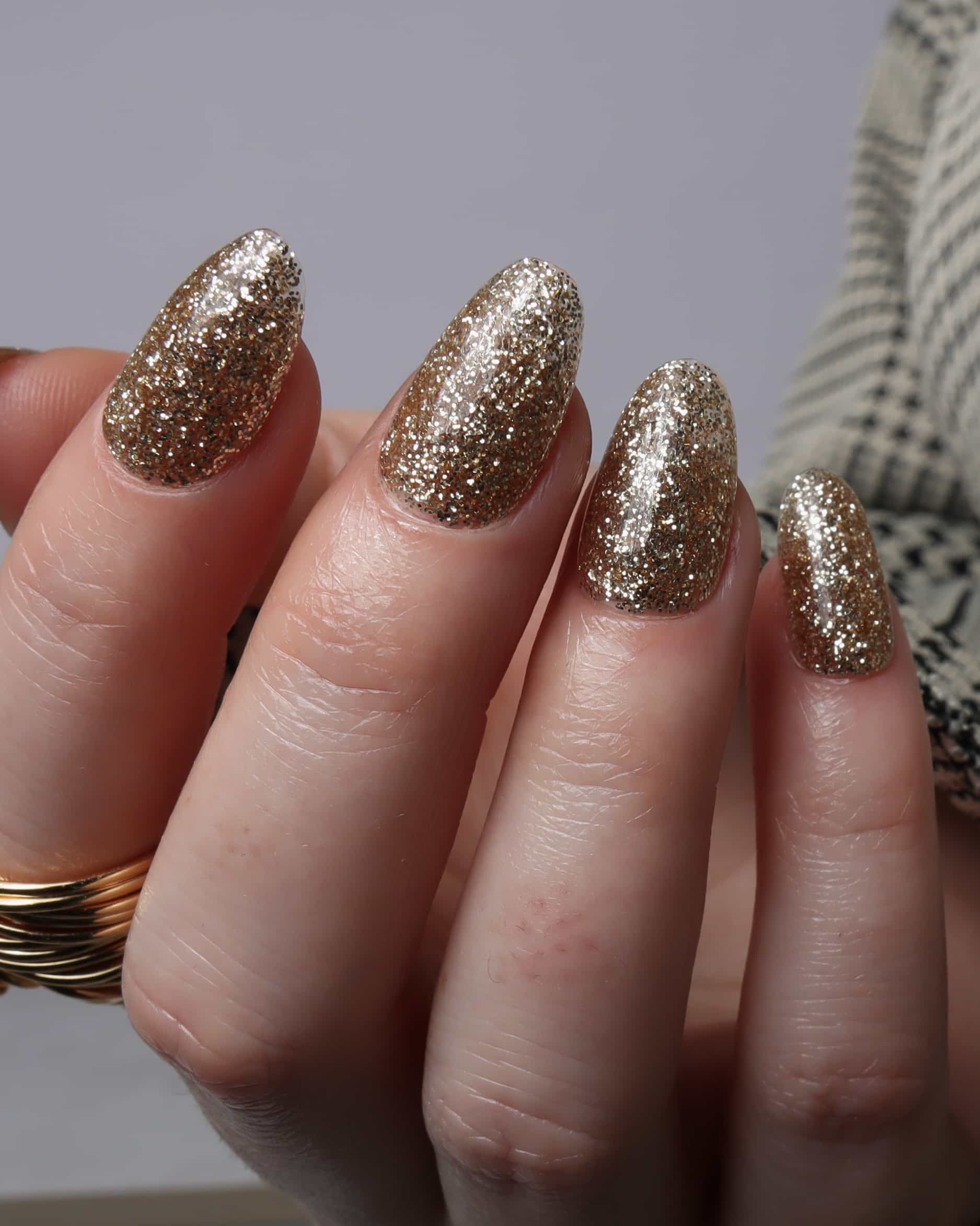 Glitter nails. Encapsulated glitter. Reusable nail extensions. 