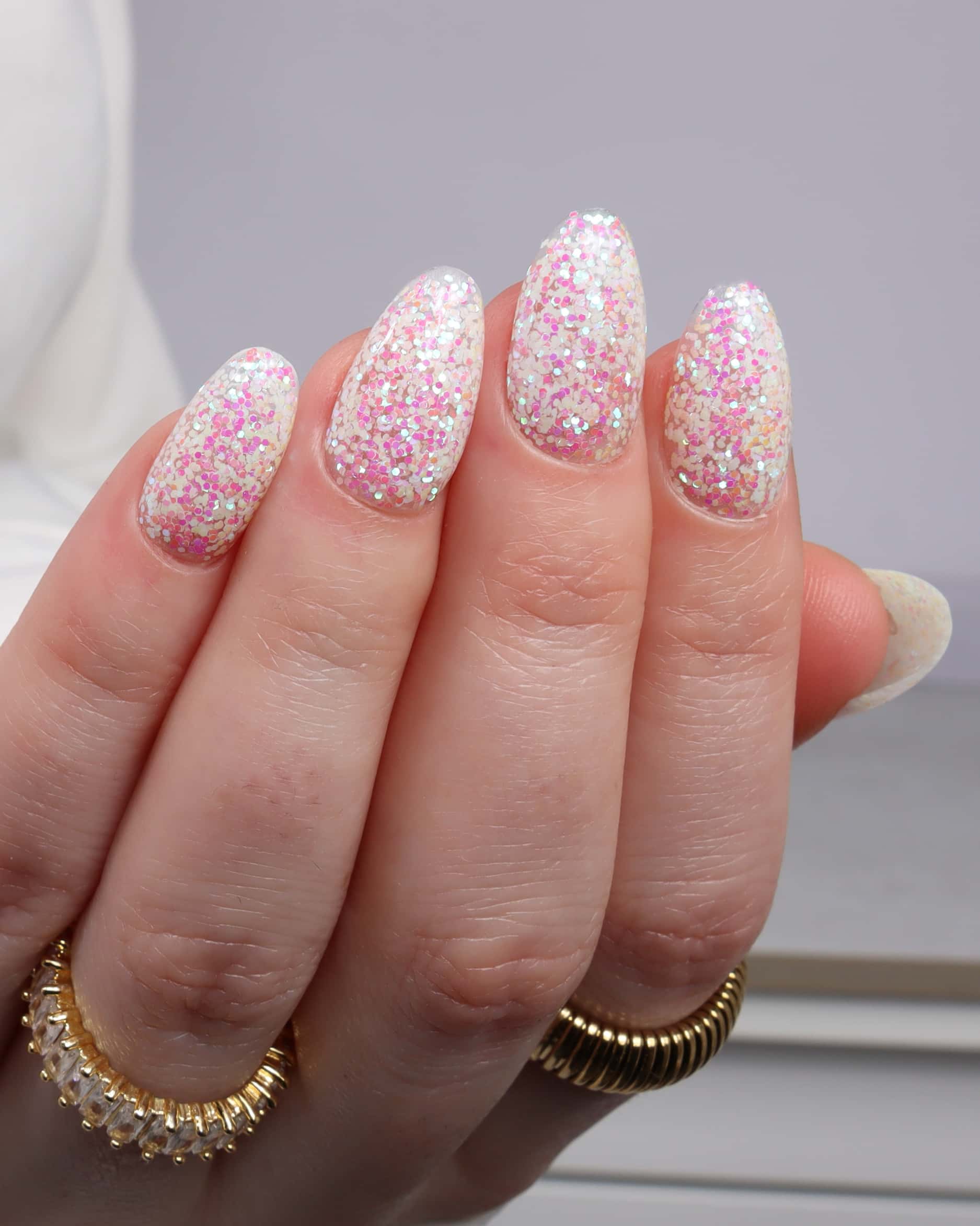Glitter nails. Encapsulated glitter. Reusable nail extensions. 