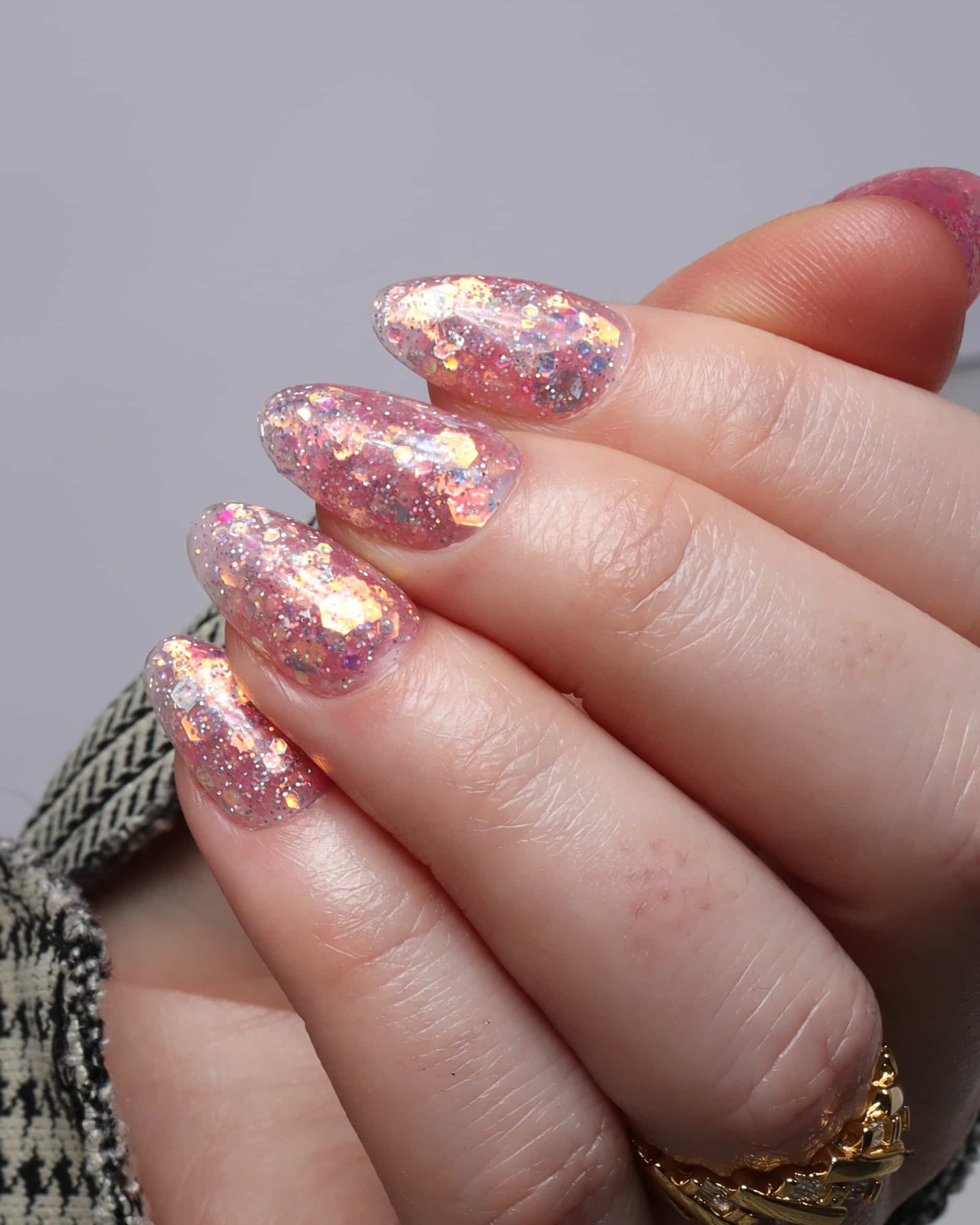 Glitter nails. Encapsulated glitter. Reusable nail extensions. 