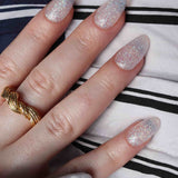 Glitter nails. Encapsulated glitter. Reusable nail extensions. 