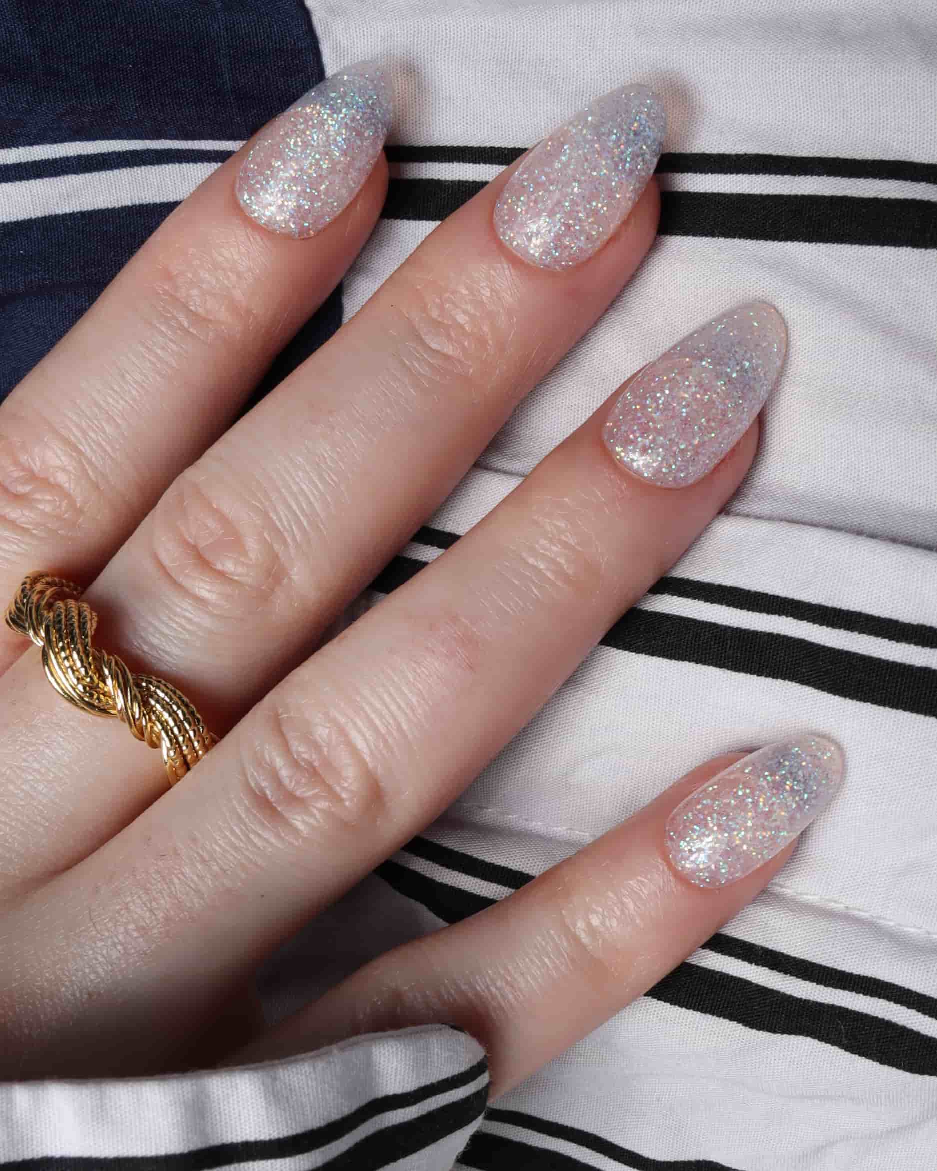 Glitter nails. Encapsulated glitter. Reusable nail extensions. 