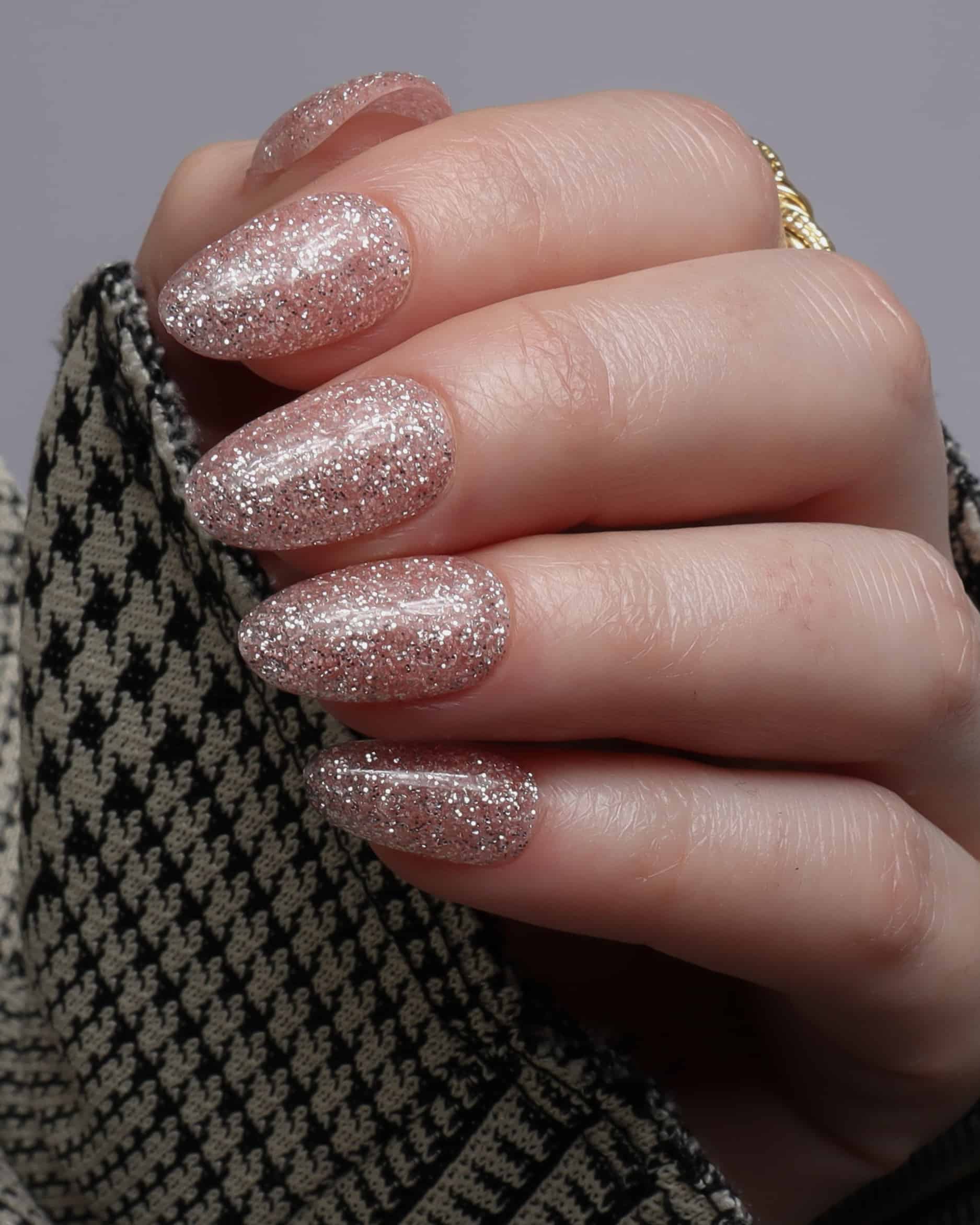 Glitter nails. Encapsulated glitter. Reusable nail extensions. 