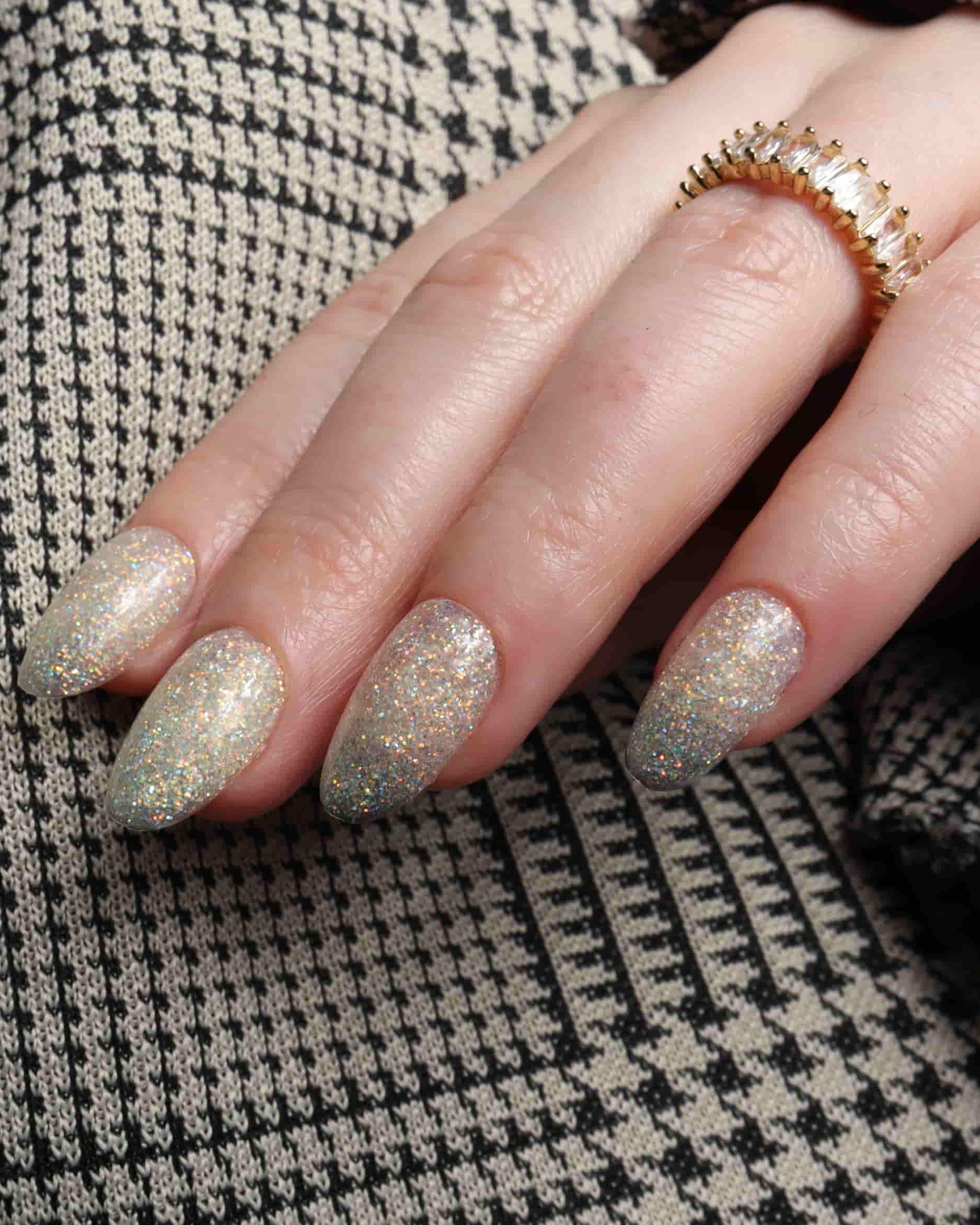 Glitter nails. Encapsulated glitter. Reusable nail extensions. 