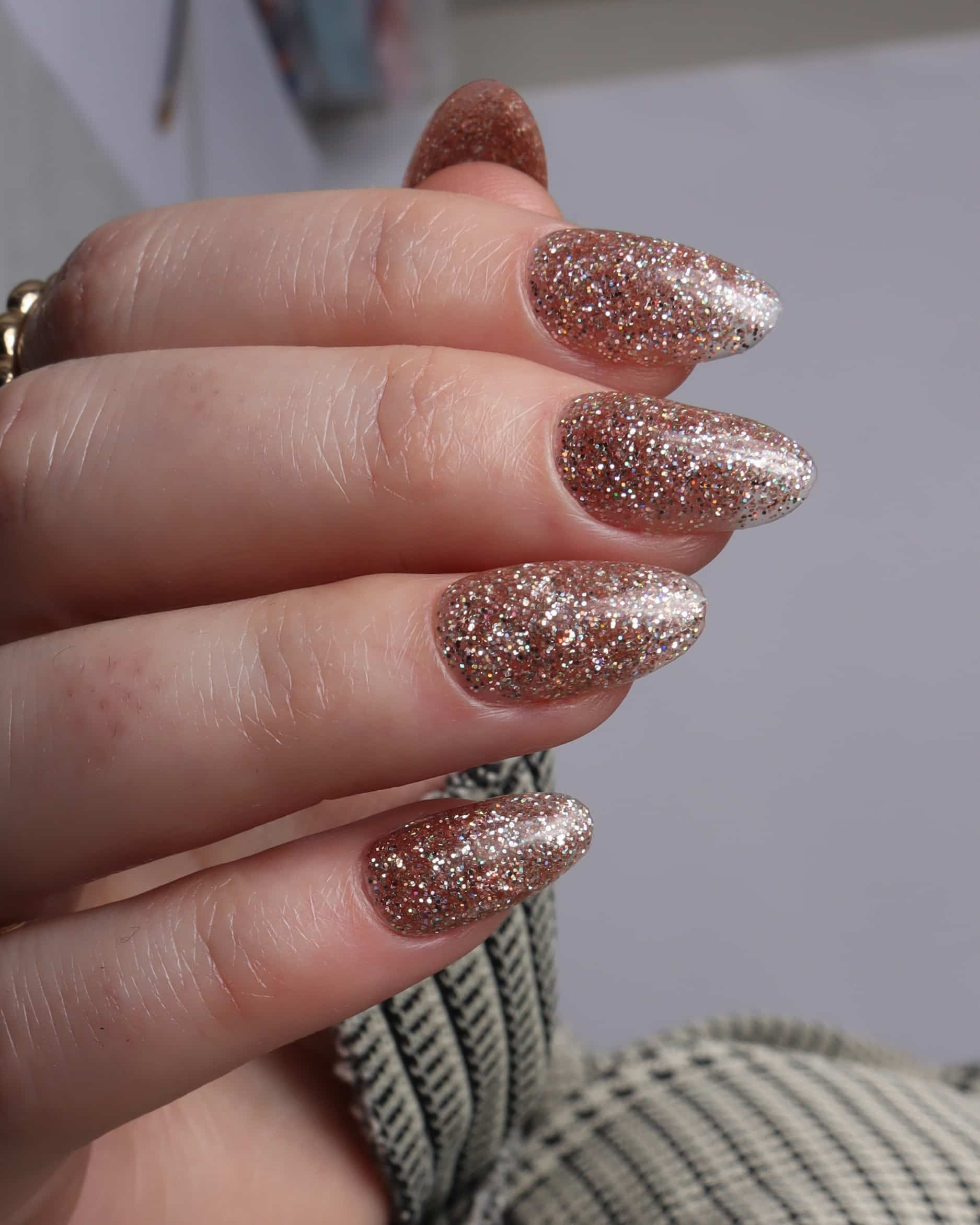Glitter nails. Encapsulated glitter. Reusable nail extensions. 