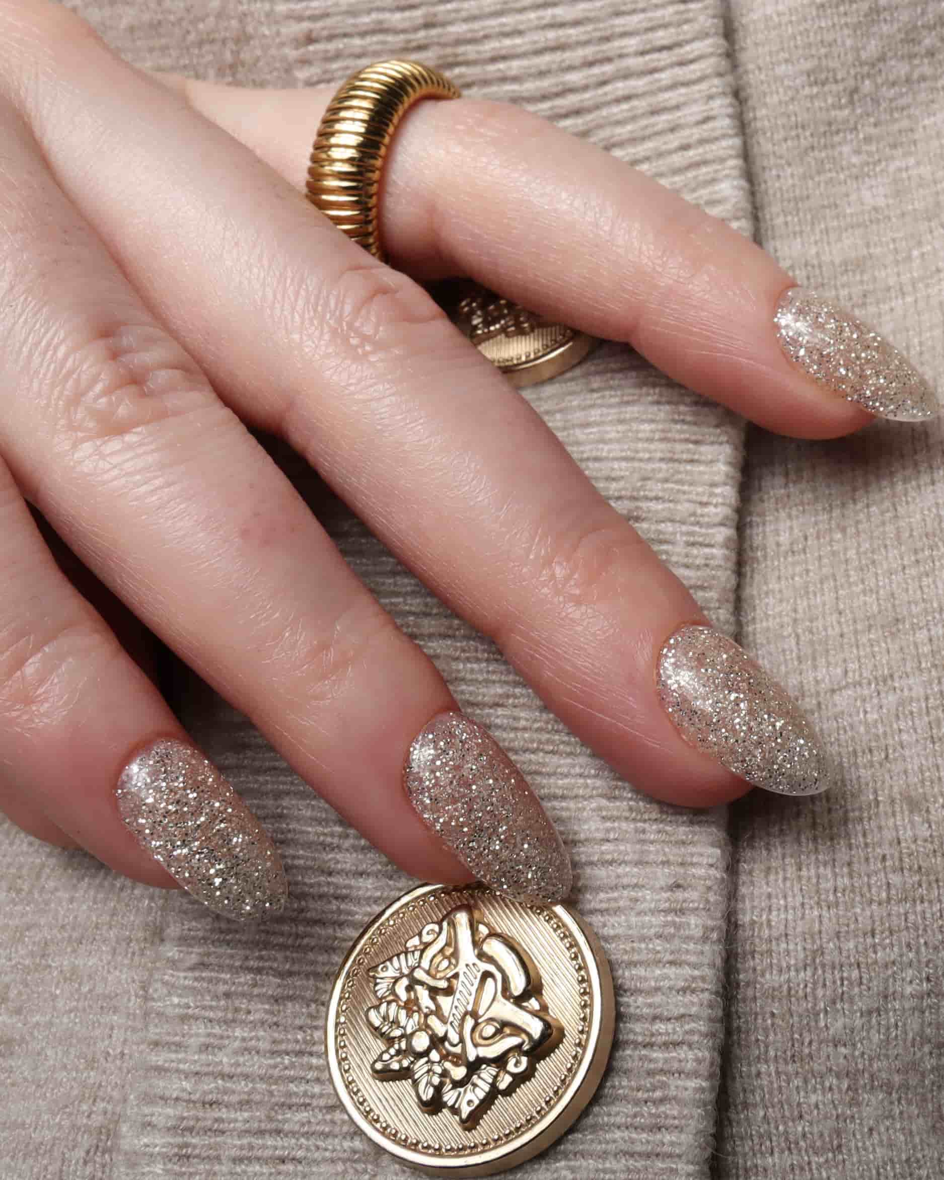 Glitter nails. Encapsulated glitter. Reusable nail extensions. 