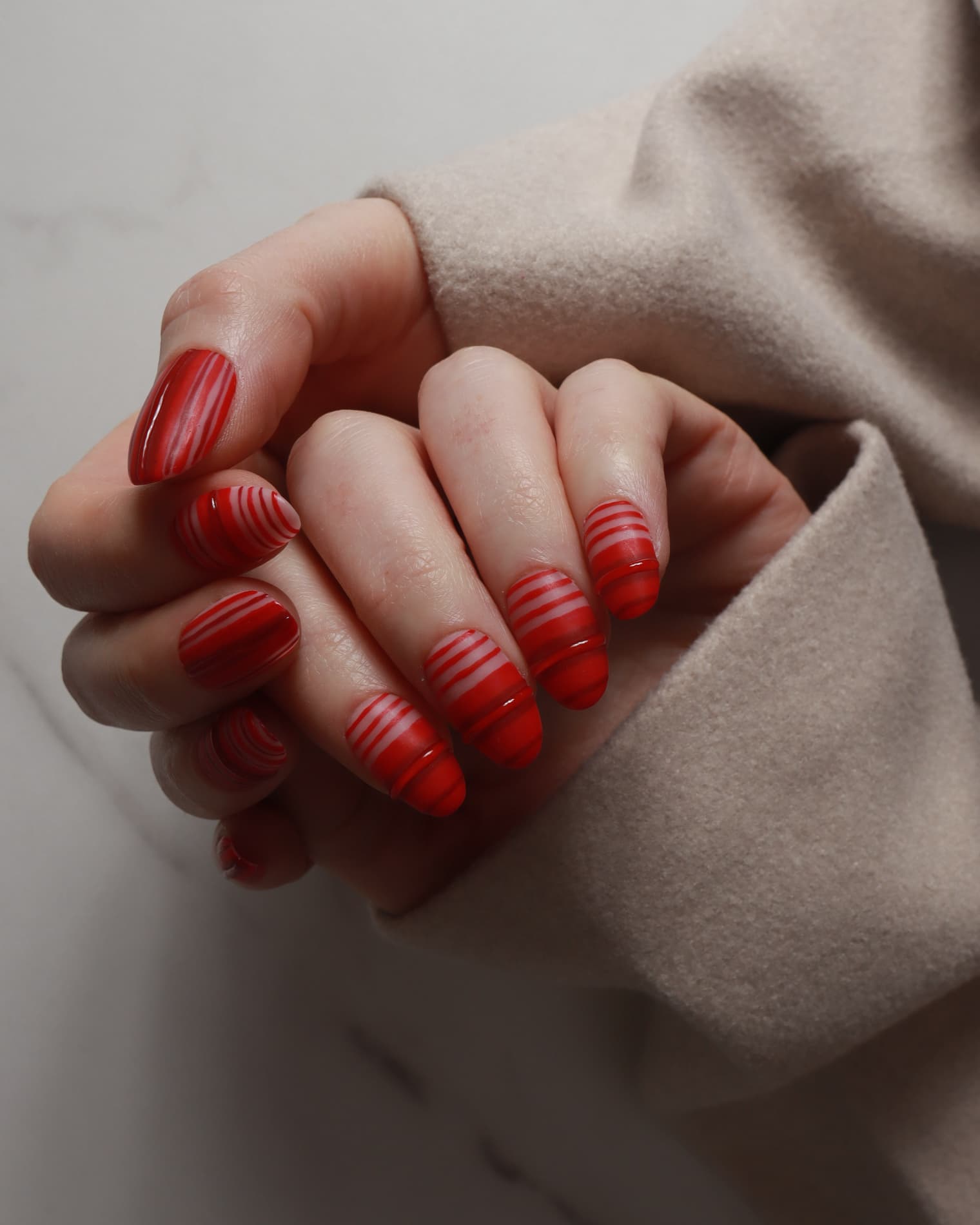 Striped Nails designed. Red striped nails. Fall nail extensions. Reusable nail extensions by Inglass Nails. 
