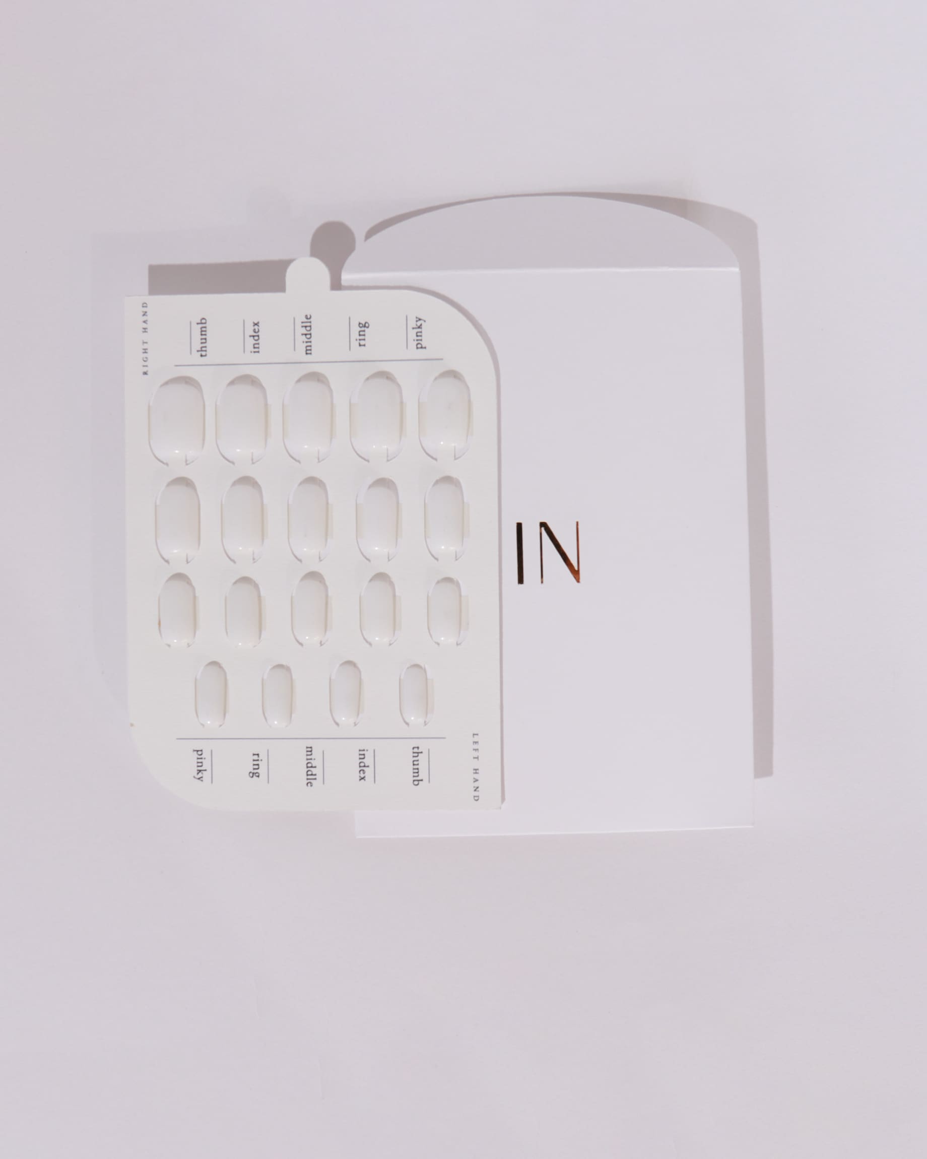 The Sizing Swatches for Inglass Nails. 19 Nail extensions swatches in gray and white background. 