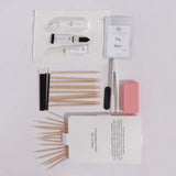 Set of nail care tools including files, cuticle sticks, and bonder and debonder by inglass nails