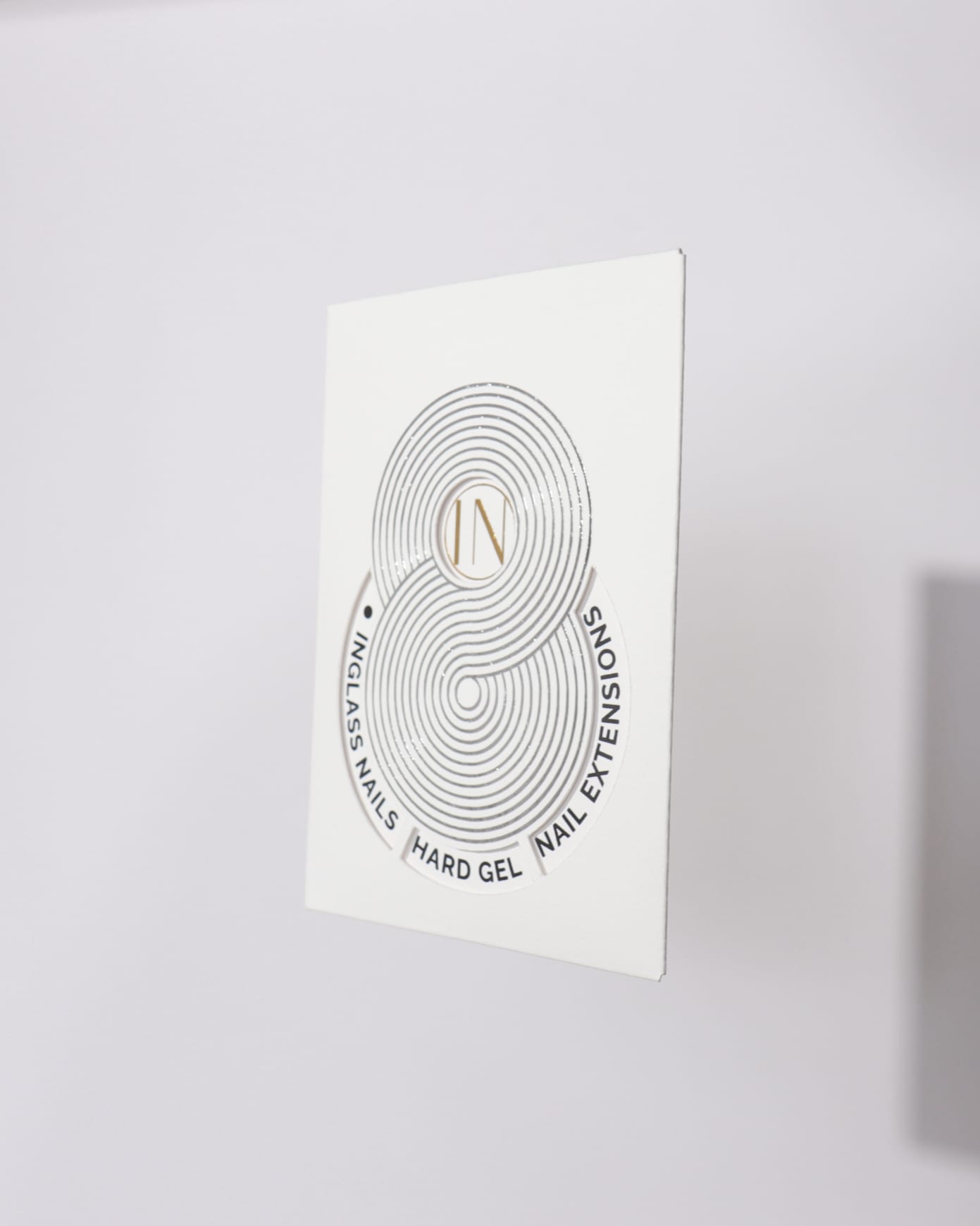 Inglass nails extensions box in white background. 