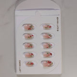 Packaged nail art stickers with floral designs on a white background