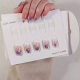 purple flowers nail extensions on hand with box
