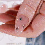 Hard gel nail extensions with crystals by inglass nails. 