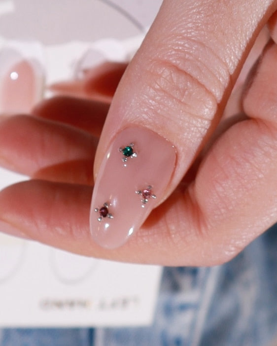 Hard gel nail extensions with crystals by inglass nails. 