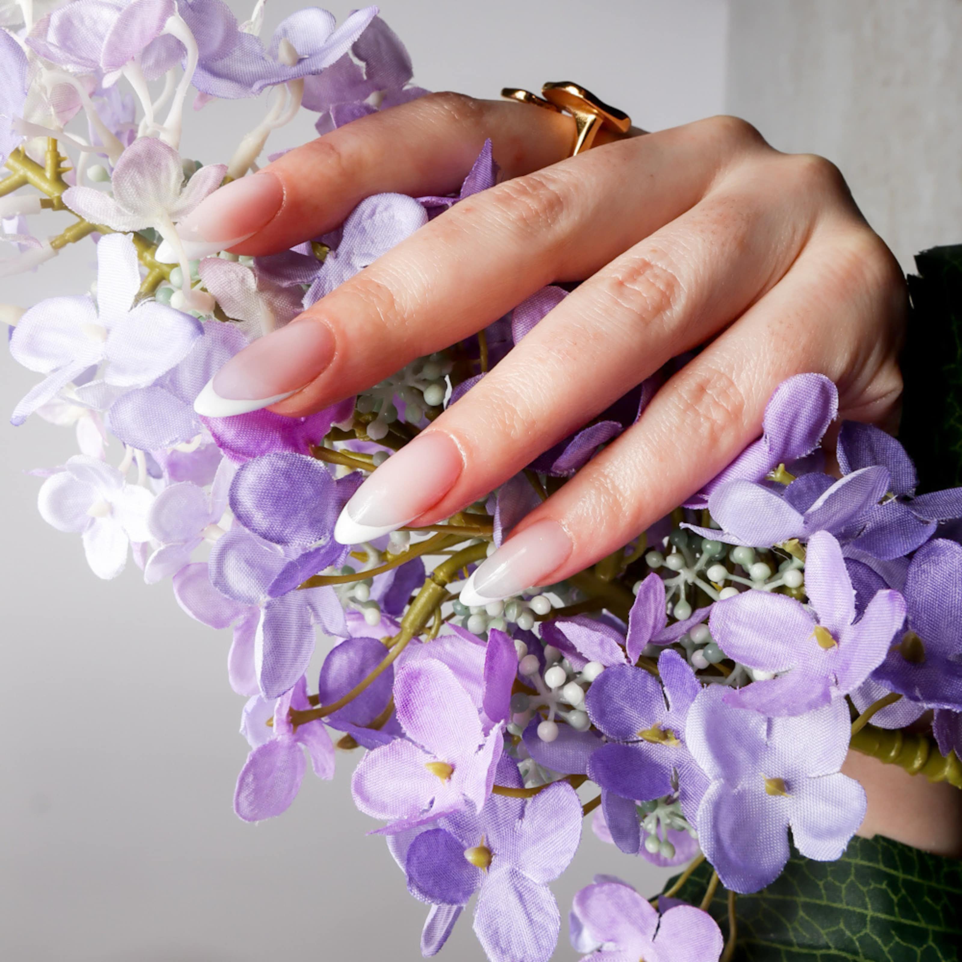White French nails. Reusable nail extensions. Long almond French nails. 