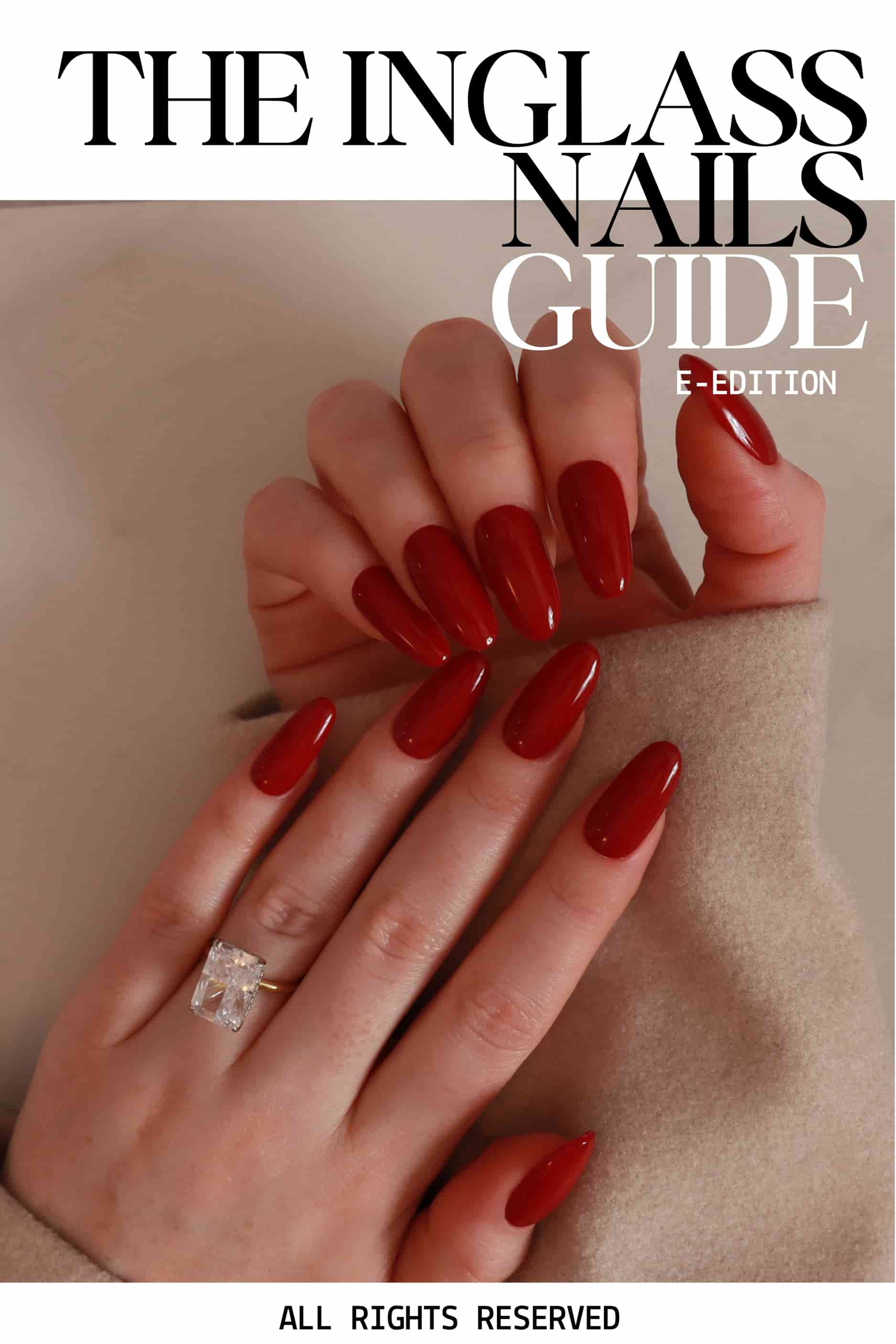 Hand with red nails and a diamond ring on a neutral background, featuring 'The Inglass Nails Guide' text.