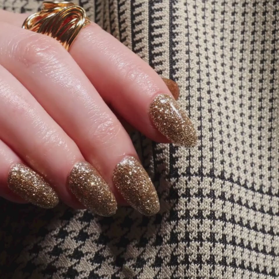 Glitter nails. Encapsulated glitter. Reusable nail extensions. 