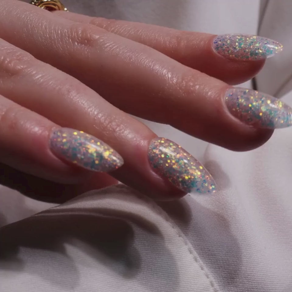 Glitter nails. Encapsulated glitter. Reusable nail extensions. 