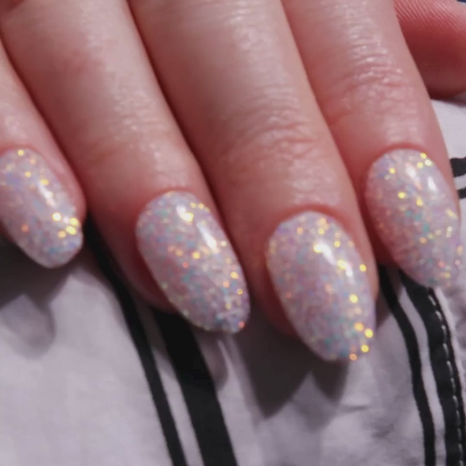 Glitter nails. Encapsulated glitter. Reusable nail extensions. 