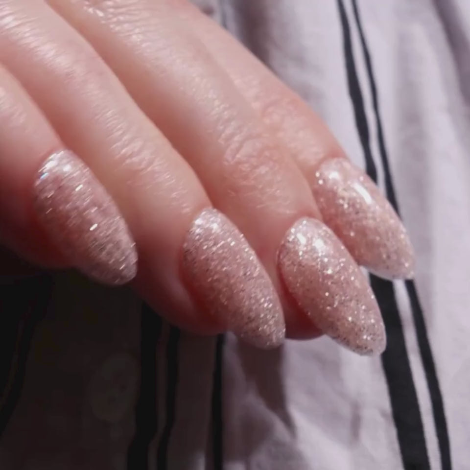 Glitter nails. Encapsulated glitter. Reusable nail extensions. 