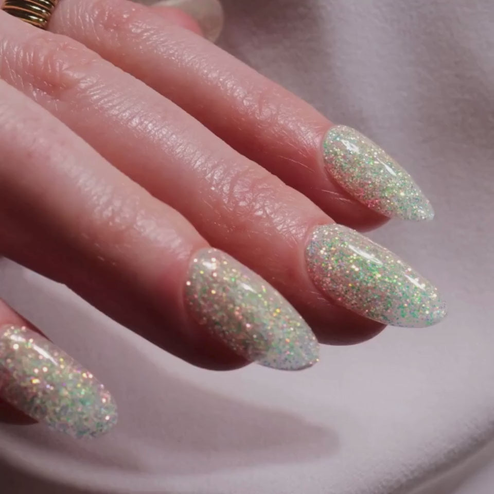 Glitter nails. Encapsulated glitter. Reusable nail extensions. 