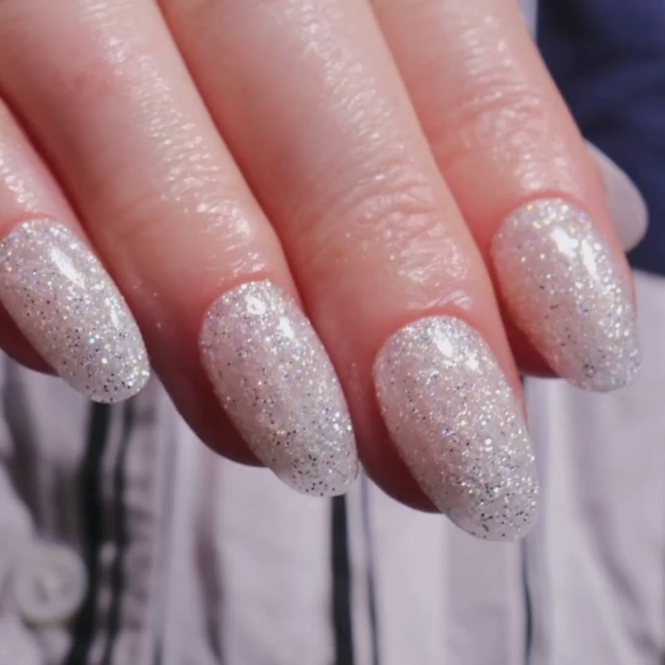 Glitter nails. Encapsulated glitter. Reusable nail extensions. 