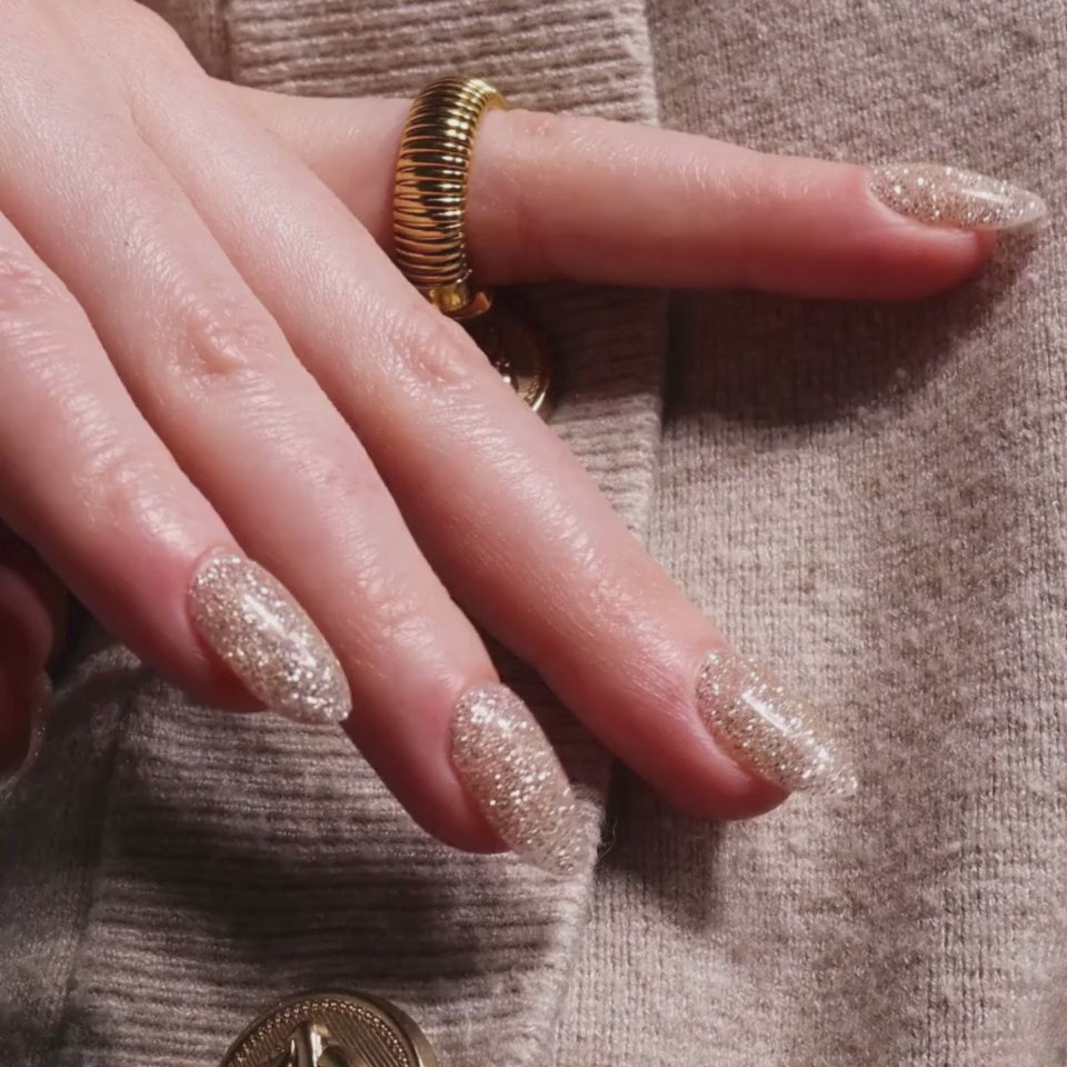 Glitter nails. Encapsulated glitter. Reusable nail extensions. 