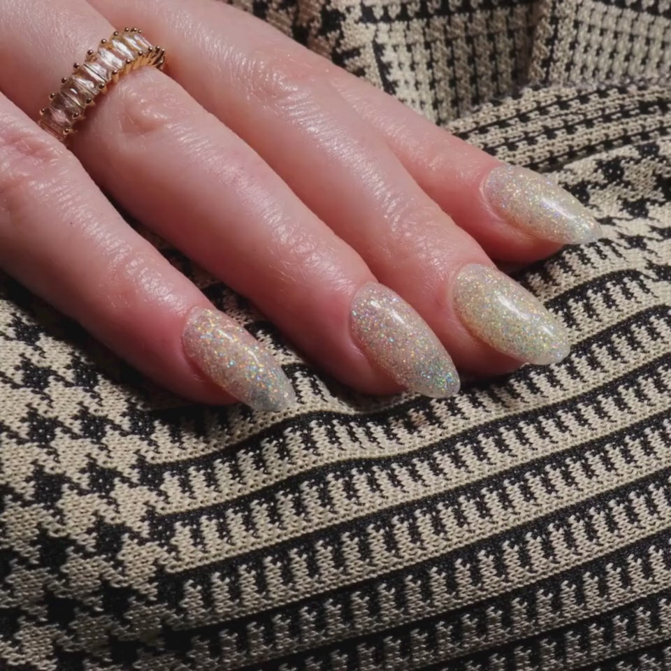 Glitter nails. Encapsulated glitter. Reusable nail extensions. 